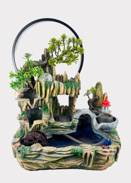 Mountain pagoda ring light tabletop fountain with LED crystal ball and water wheel - front view - Rainbow Rosemead