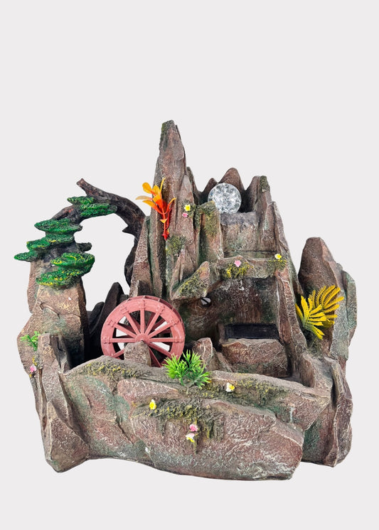 Mountain rock tabletop fountain with LED crystal ball and red water wheel – front view - Rainbow Rosemead