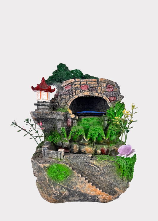 Pagoda bridge tabletop fountain with mossy rocks, flowers, and flowing water - front view – Rainbow Rosemead