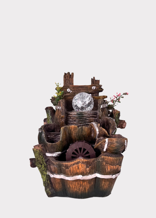 Rustic barrel cascade tabletop fountain with LED crystal ball and water wheel – front view - Rainbow Rosemead