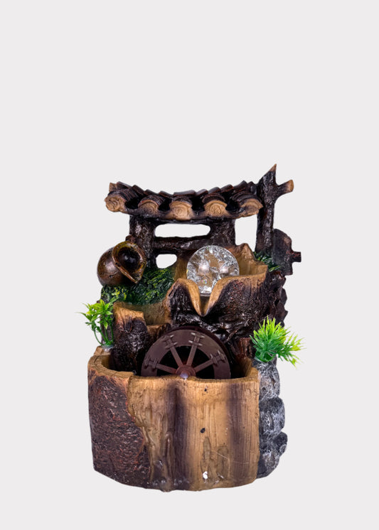 Rustic well water wheel tabletop fountain with glowing crystal ball and roof design - front view - Rainbow Rosemead